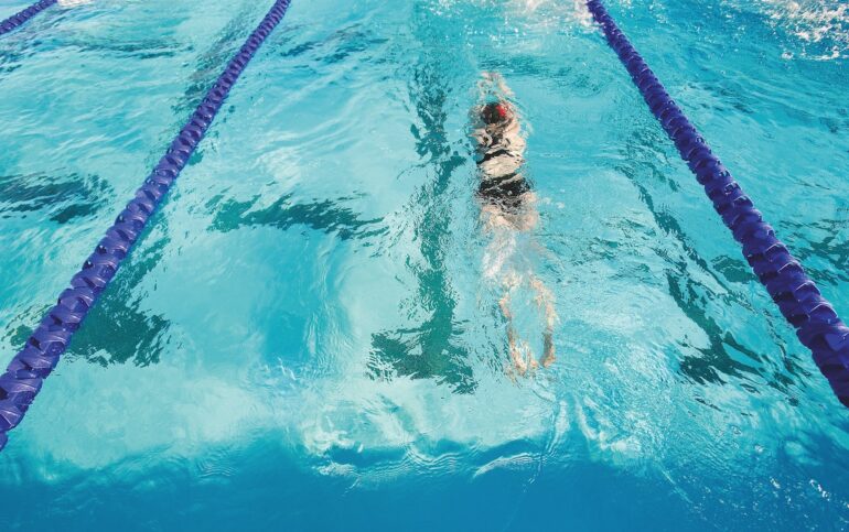Strawberry Seals swim league, swimmer in the water swimming