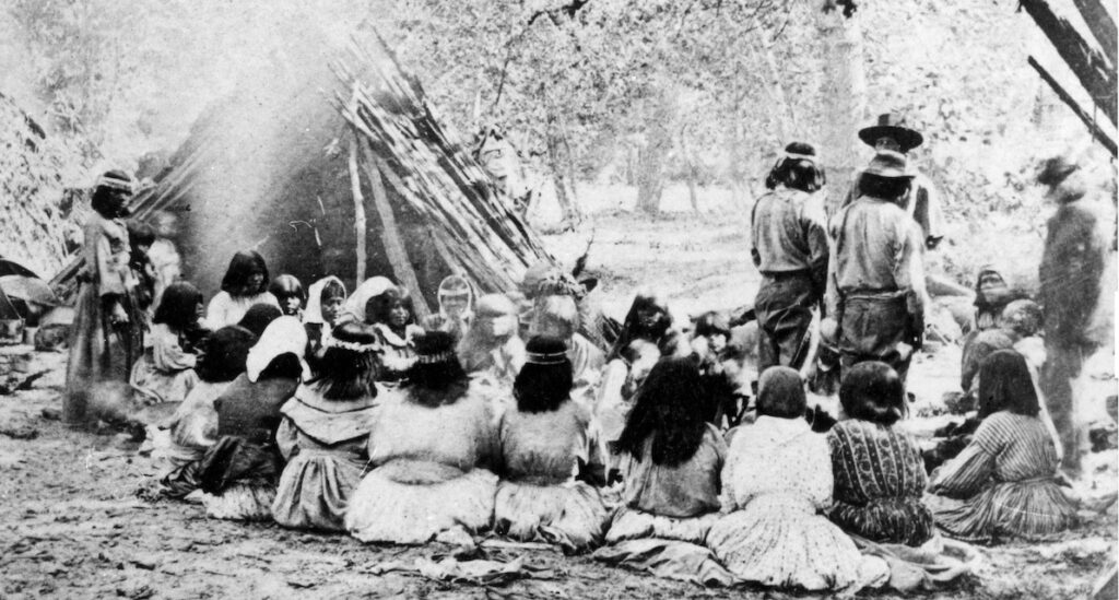 A black and white image of a group of Miwok Indians