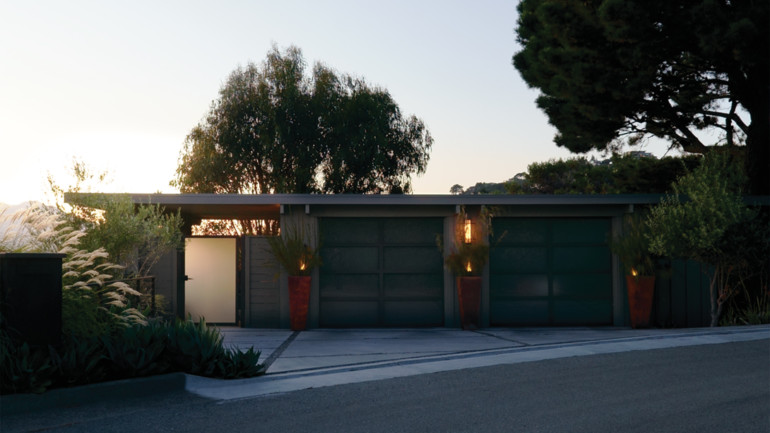 New garage doors and updated colors add curb appeal.