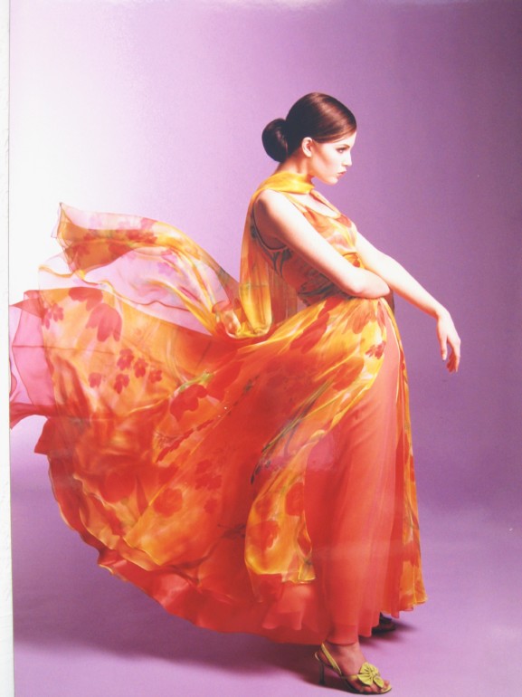 Lily Samii couture designer, orange flowy dress, high fashion