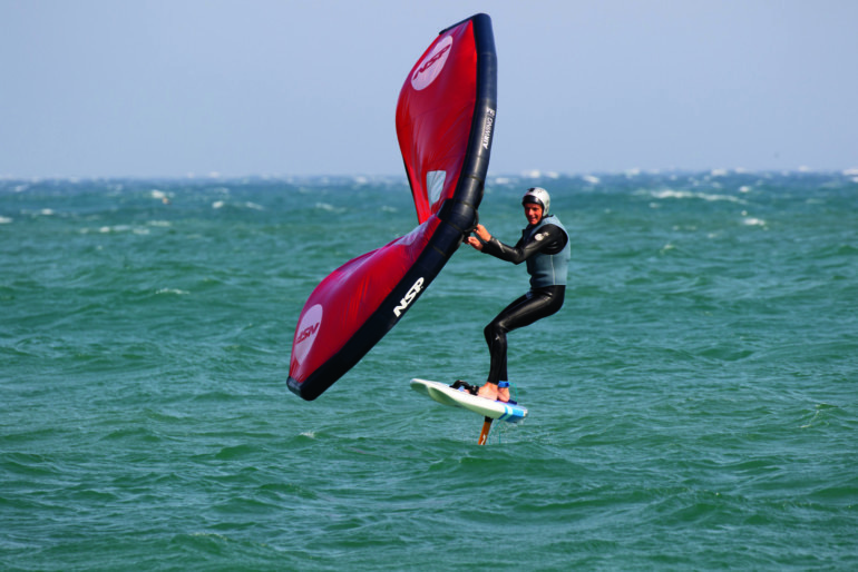 Wing Foiling at Hebara Beach surfer water sports trends 2021