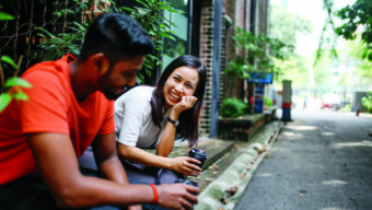 Couple talking, Friends Chatting Outdoors in Kuala Lumpur, Malaysia, Marin Magazine