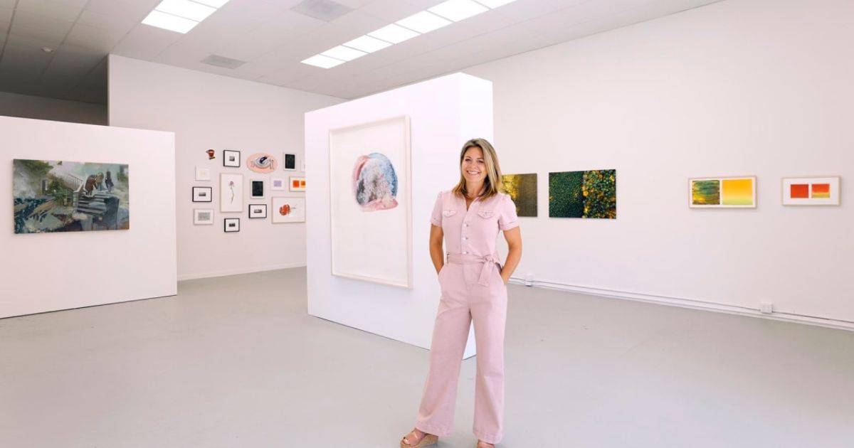 lady standing in art gallery