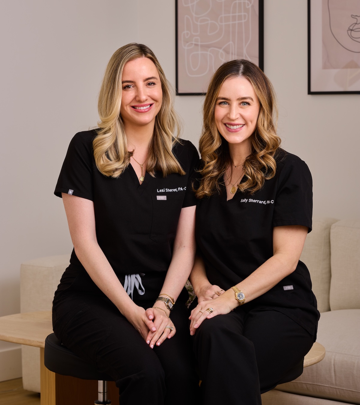 Two surgeons sit side by side at Sieber Plastic Surgery