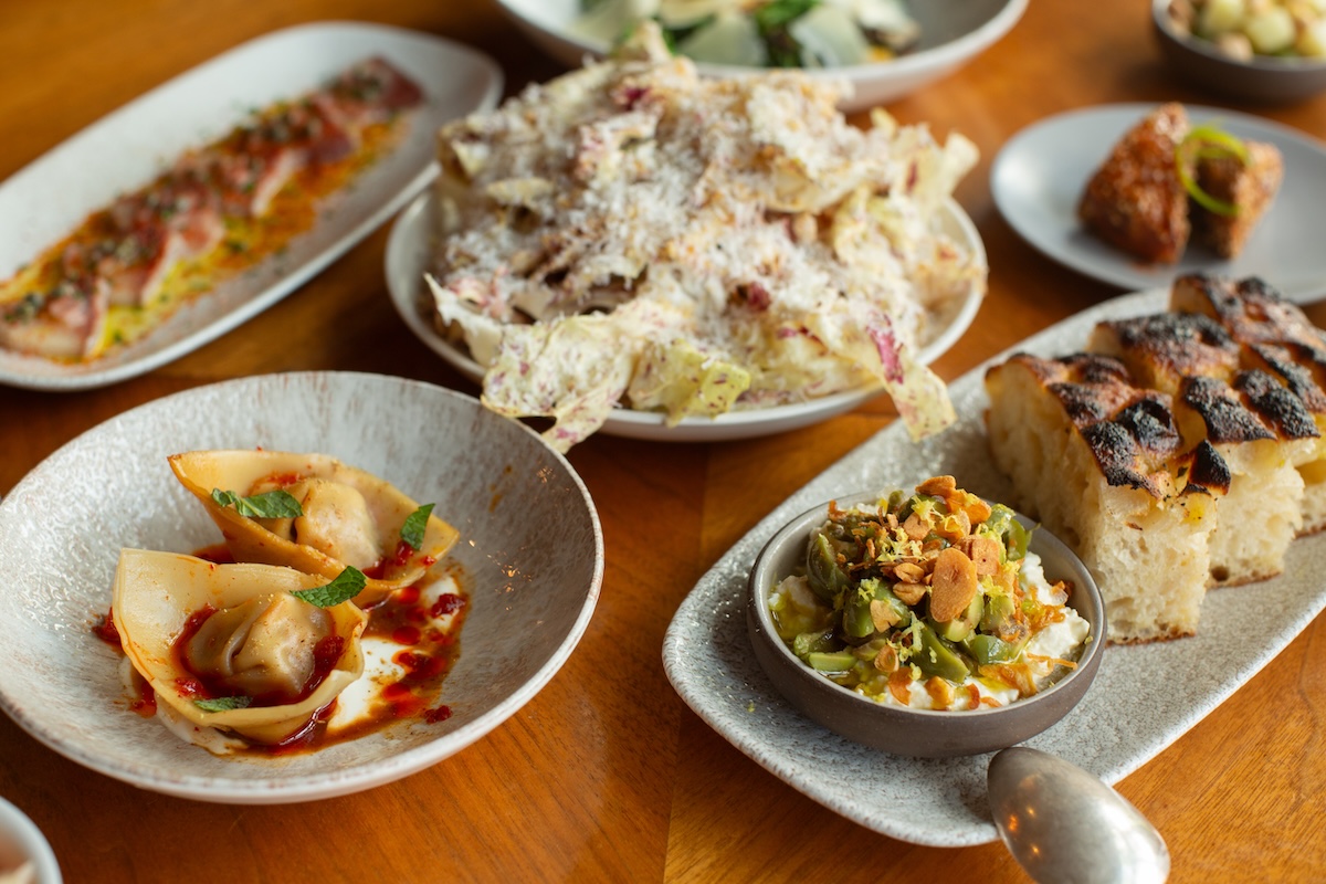 A table with plates of food.