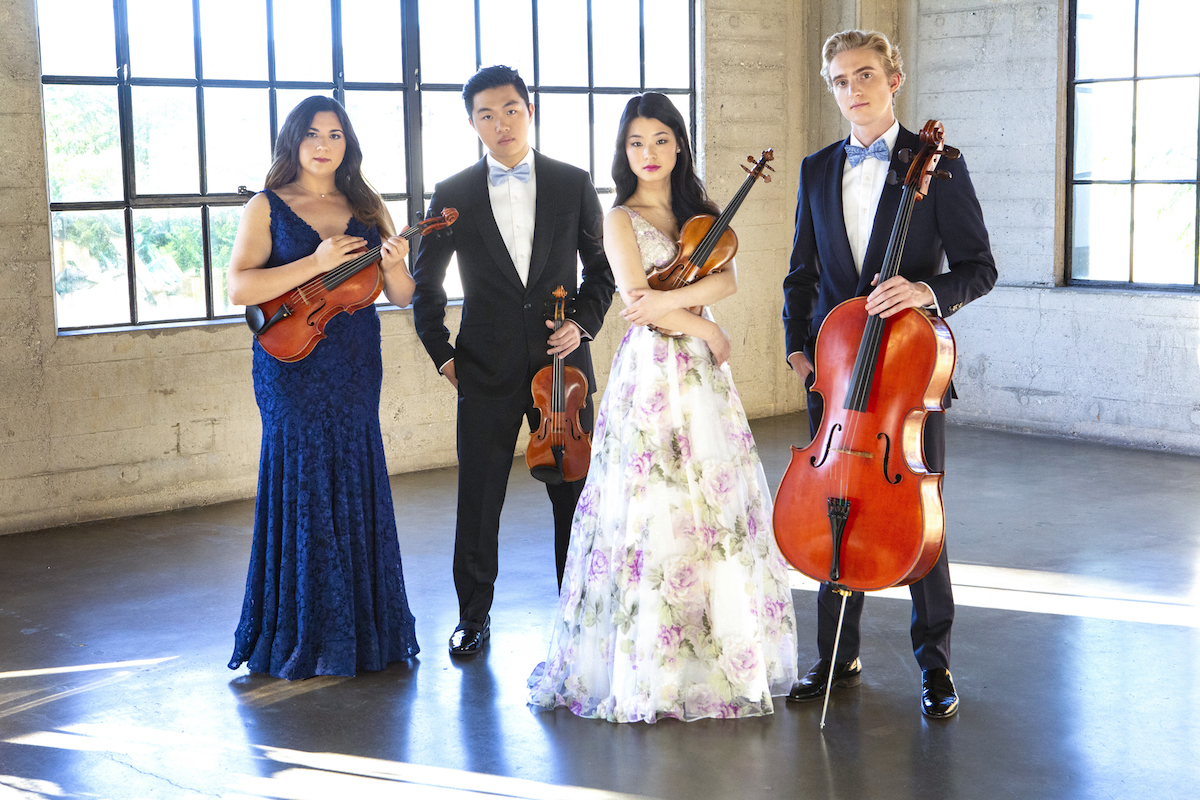 The Viano String Quartet pose with their instruments to advertise concert at Marin Chamber Music