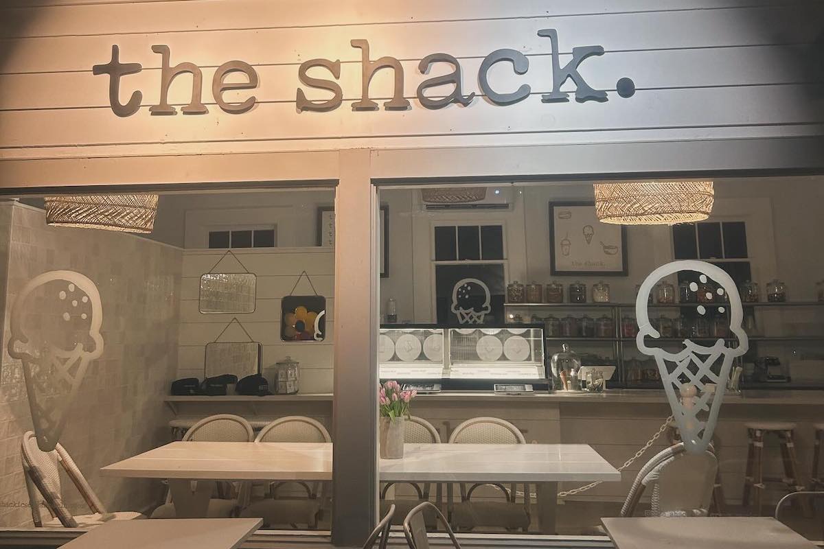 Exterior of the ice cream restaurant "the Shack", looking into its interior through windows. 