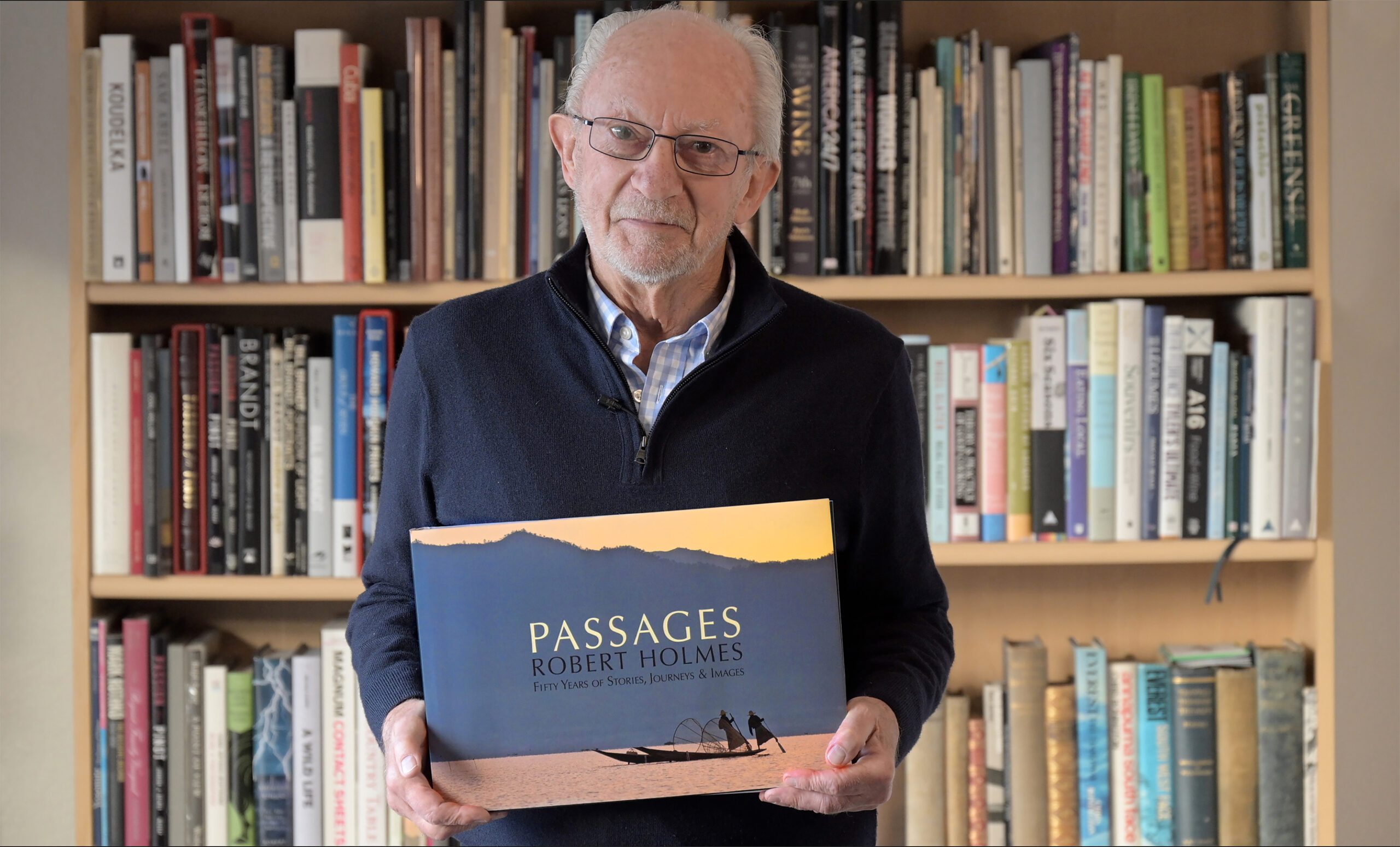 Robert Holmes with his new book Passages
