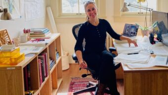 Christina Hansen sits in her office.