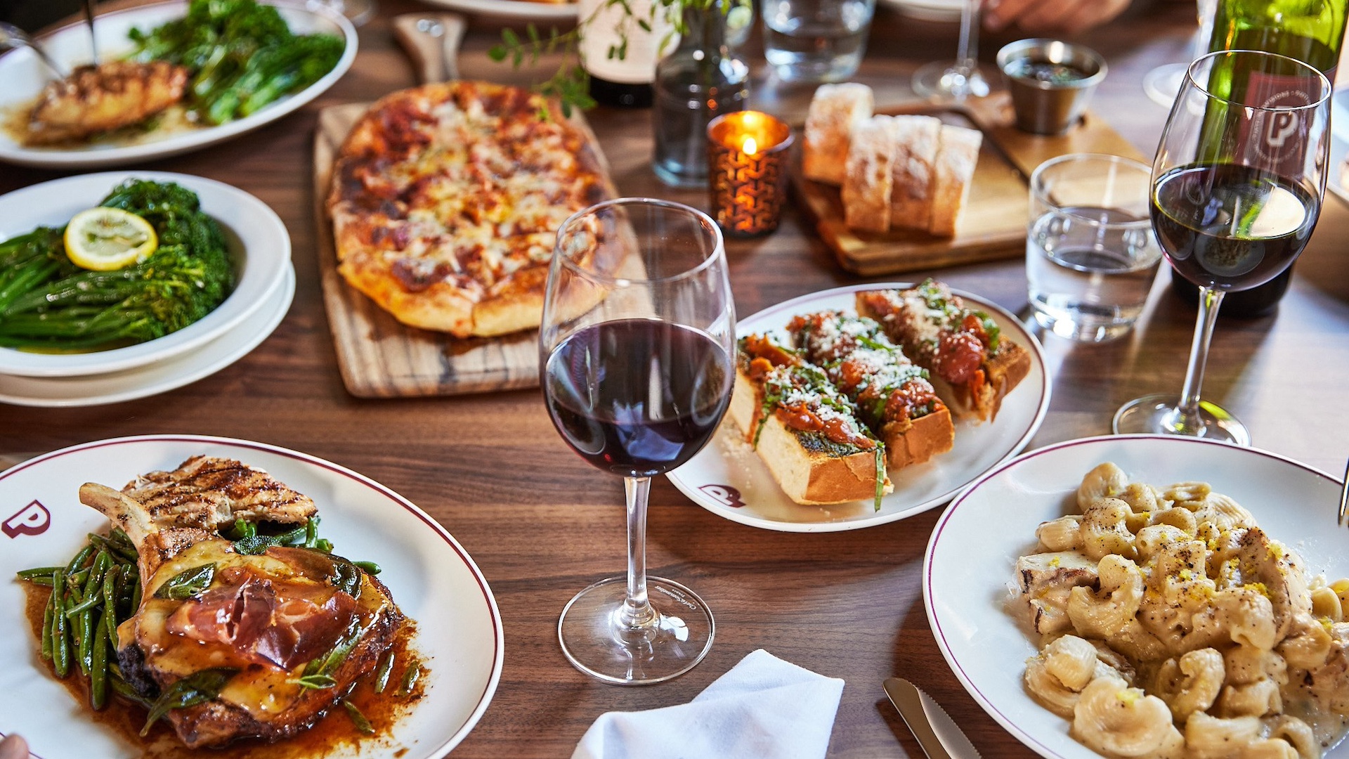Piatti Mill Valley table with dishes and wine