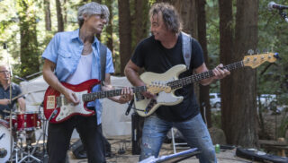 Two guitarists on stage at Mill Valley Fall Arts Fest