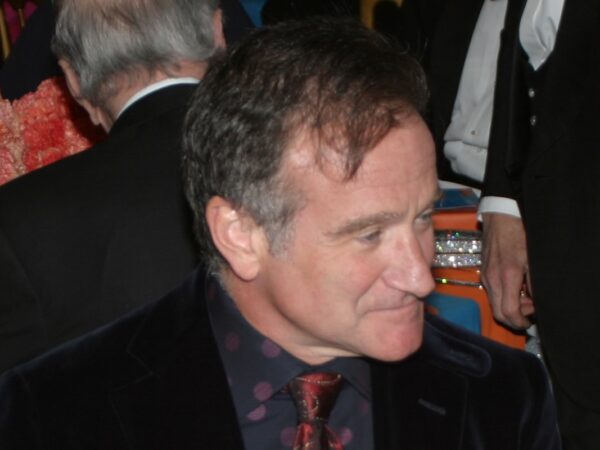 A close-up of Robin Williams at a party.