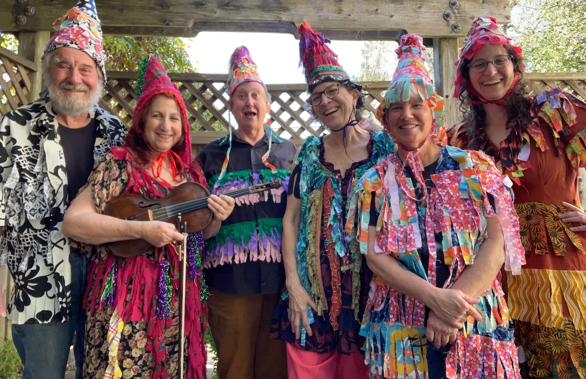 The band Aux Cajunals, one of many Marin concerts this April, dressed in colorful Mardi Gras costumes