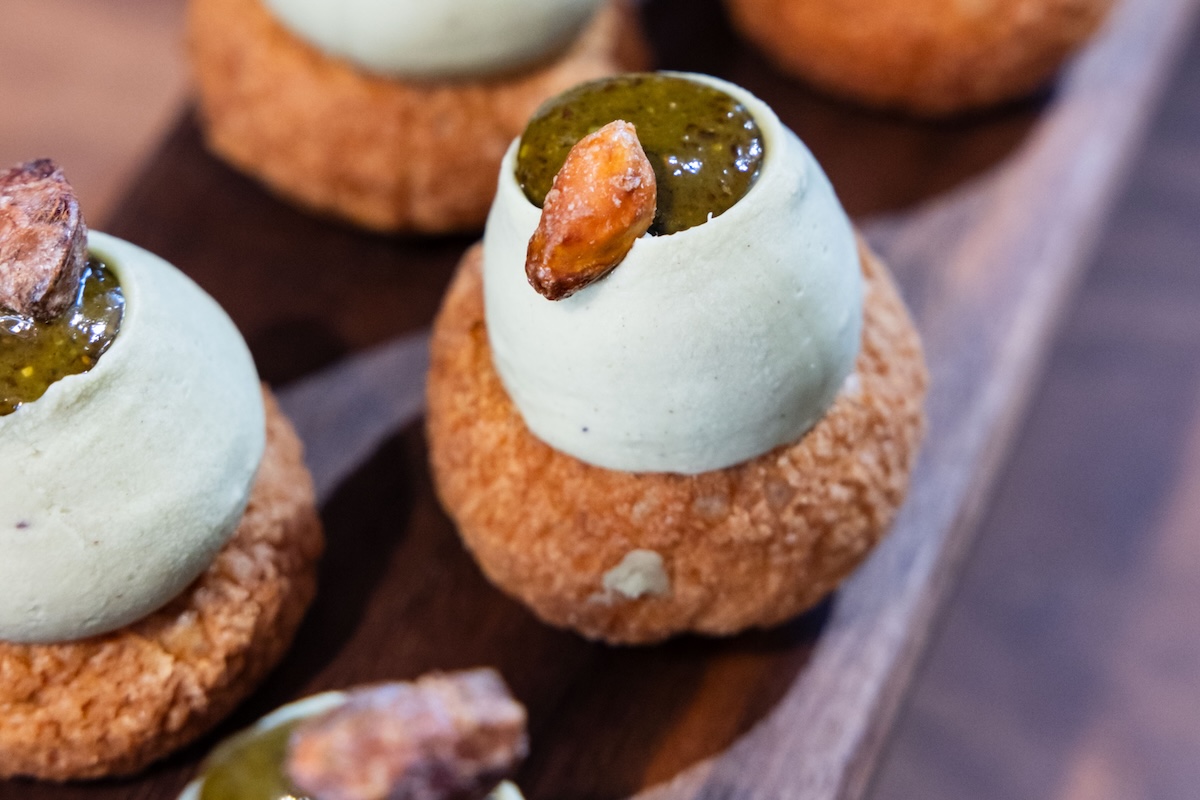 A pistachio chantilly pastry puff.