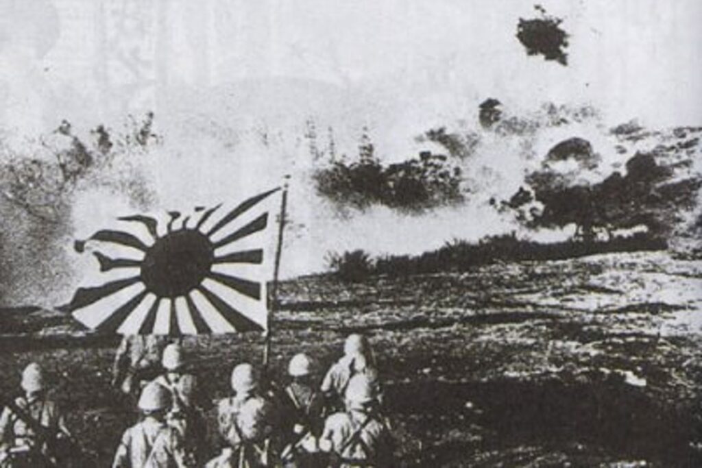 A photo featuring Japanese naval landing forces blasting Chinese pillbox and marching with the naval flag in Guangdon Province where Taishan is located.