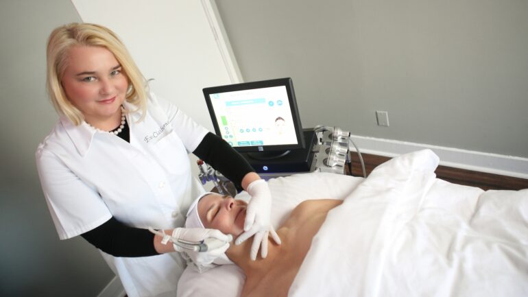 Eva Claiborne performing a skin procedure
