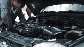 mechanic working on car