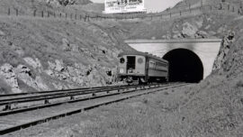 Historic photo of an electric powered interurban railcar entering the Cal Park Tunnel