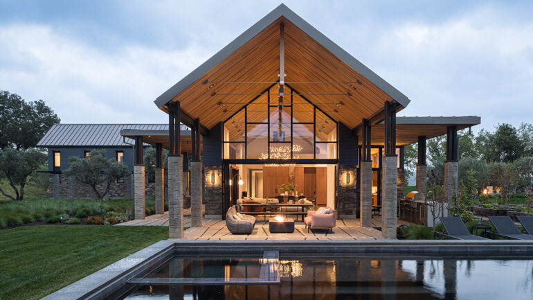 A contemporary home featuring a swimming pool and a spacious patio area for outdoor relaxation.