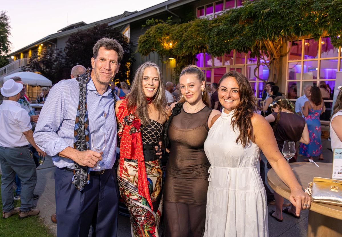 Group posing outdoors at Marin Magazine’s Best of the County 2025 Bash, smiling in evening light.