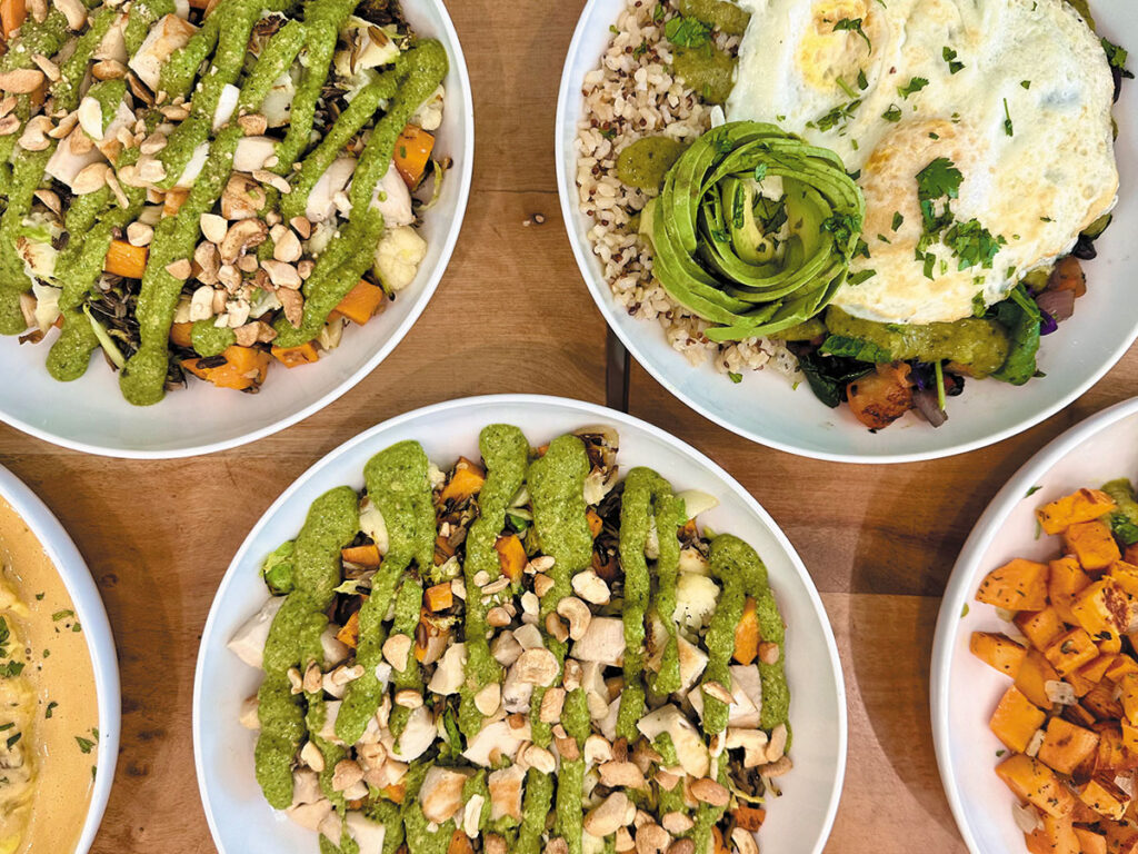 A display of five plates, each featuring different types of food, highlighting a range of culinary styles and ingredients.