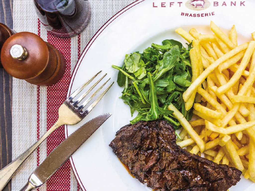 A plate featuring a juicy steak alongside golden French fries.