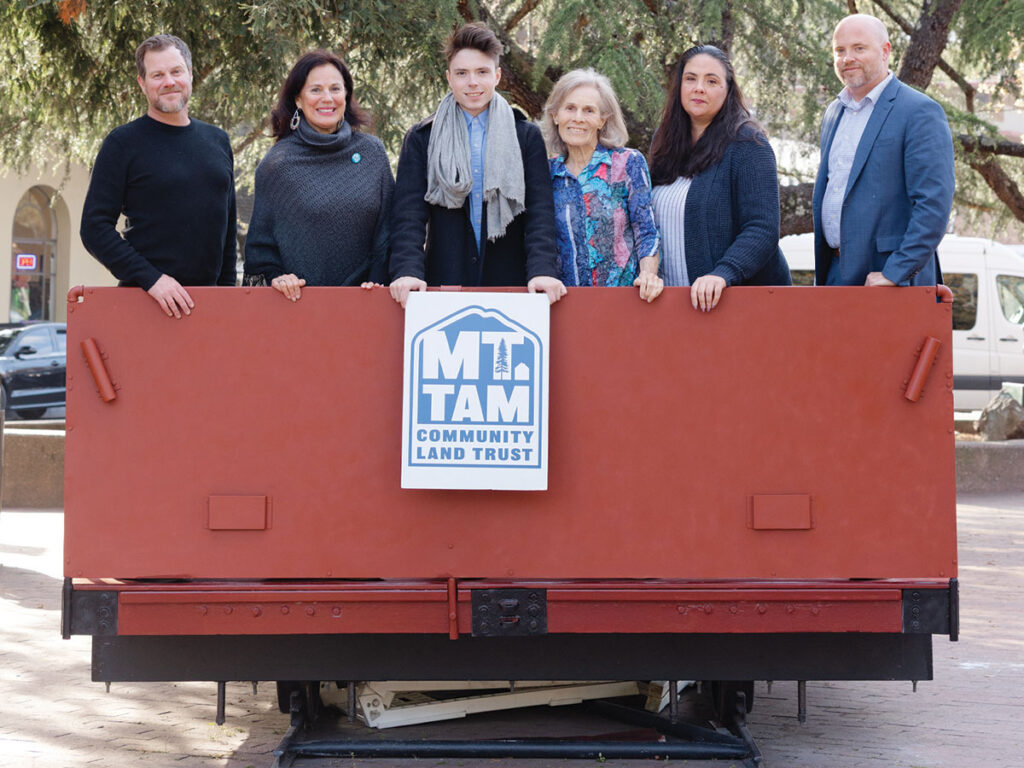 Team photo of the Mt. Tan group, showcasing members smiling together outdoors