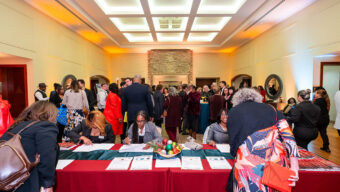 Guests check in for the gala