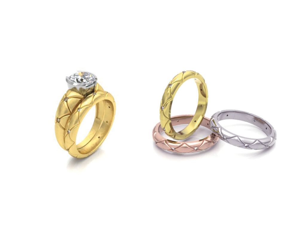 Three rings in different colors, each adorned with sparkling diamonds, displayed together on a neutral background.