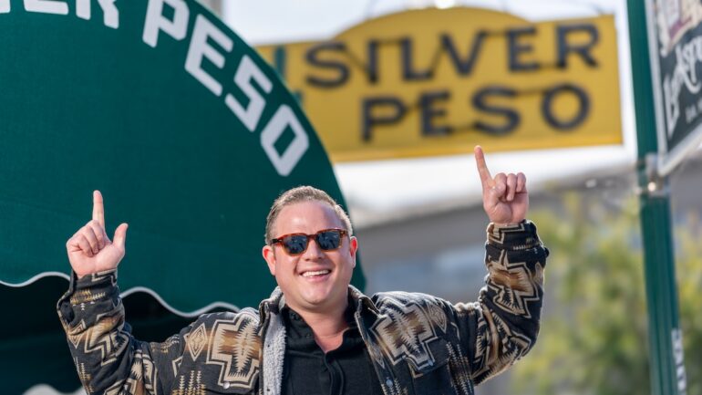Matx Perry in front of the Silver Peso