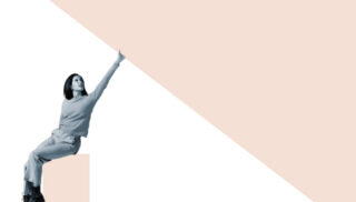 A woman in grayscale sits on a ledge, pointing upward with confidence. The background features a large beige triangle, creating a modern, dynamic feel.