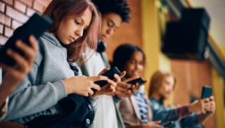 high schoolers on phone