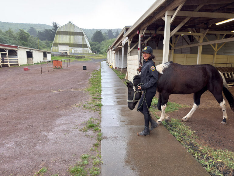 Simone Walking Cooper Through The Barn