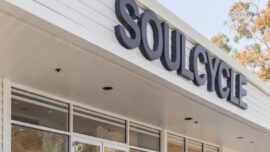 The facade of a building with the logo soulcycle