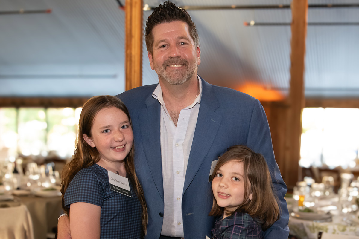 2026 Champion for Children Dustin Valette with his daughters, Photo Credit Stuart Lirette