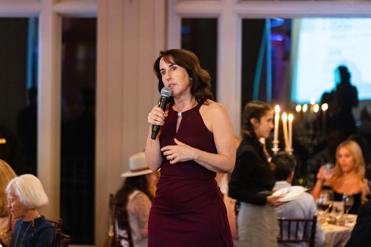 Christine Paquette (Chief Executive Officer) Onstage - credit Natalie Schrik of Drew Altizer Photography