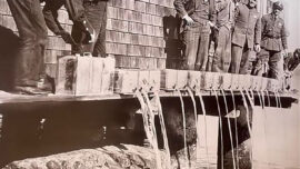 Confiscated alcohol is poured into the Bay during Prohibition