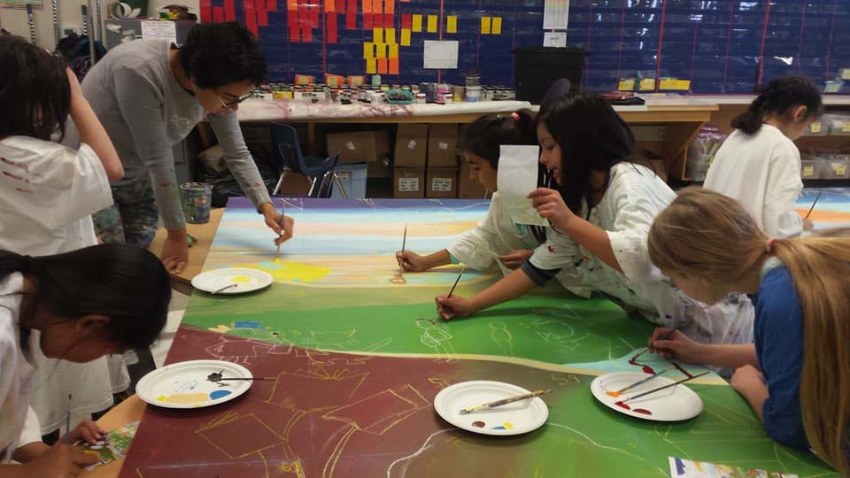 Lu Sutton Elementary students at work on the mural