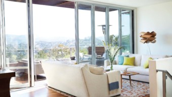 Living Space with Movable Glass Wall, Marin Home: Couple Remodels Their 70s era Tiburon Home into a Modern and Eco-friendly Space, Marin Magazine