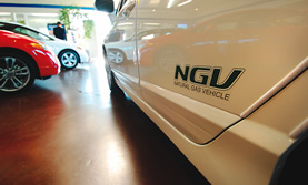 a shot of the NGV (natural gas vehicle) ensignia on a hybrid car